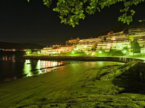 Hotel Corcubion Playa De Quenxe Esterno foto