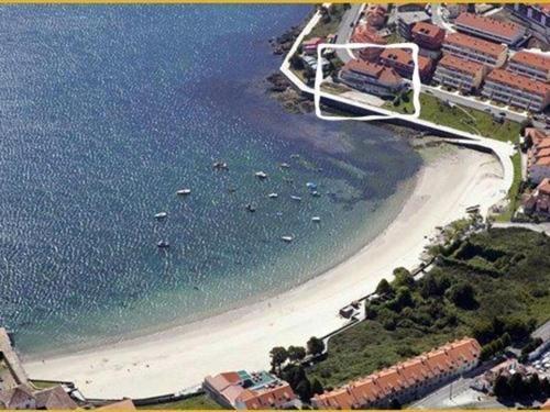 Hotel Corcubion Playa De Quenxe Esterno foto